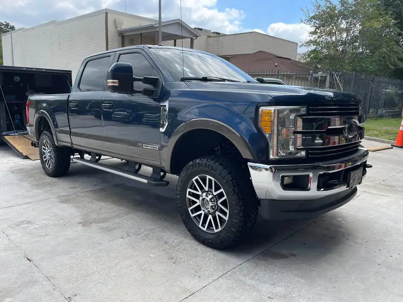 Blue Ford Super Duty pickup after paint correction by Maxx Perfection Detailing in Jacksonville