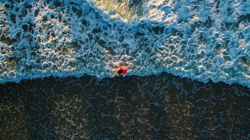 Atlantic surf rolling onto Jacksonville Beach from above